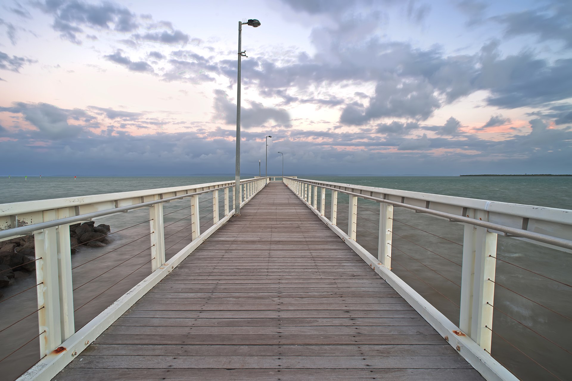 Wellington Point jetty stretching into Moreton Bay at dusk